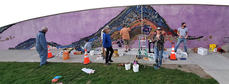 Leonard and volunteers working on the mosaic