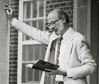 Robert Stauffer holding a book