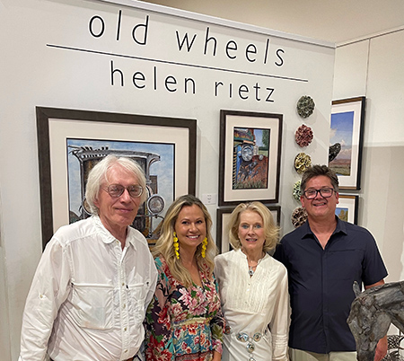 Helen Rietz '70 and friends at her exhibit Old Wheels