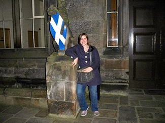 Golembiewski next to a Scottish crest 