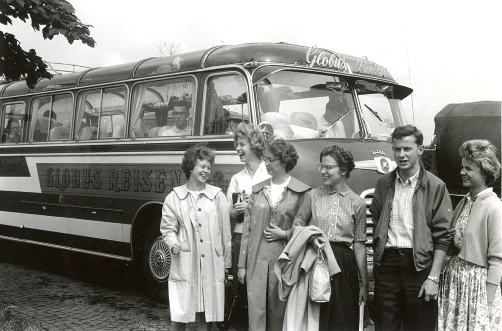 Vintage photo of K students outside a bus