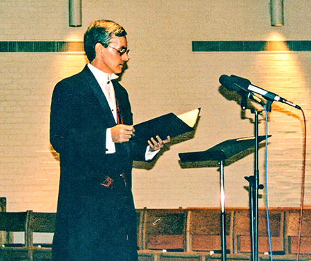 Meier singing at Xavier University