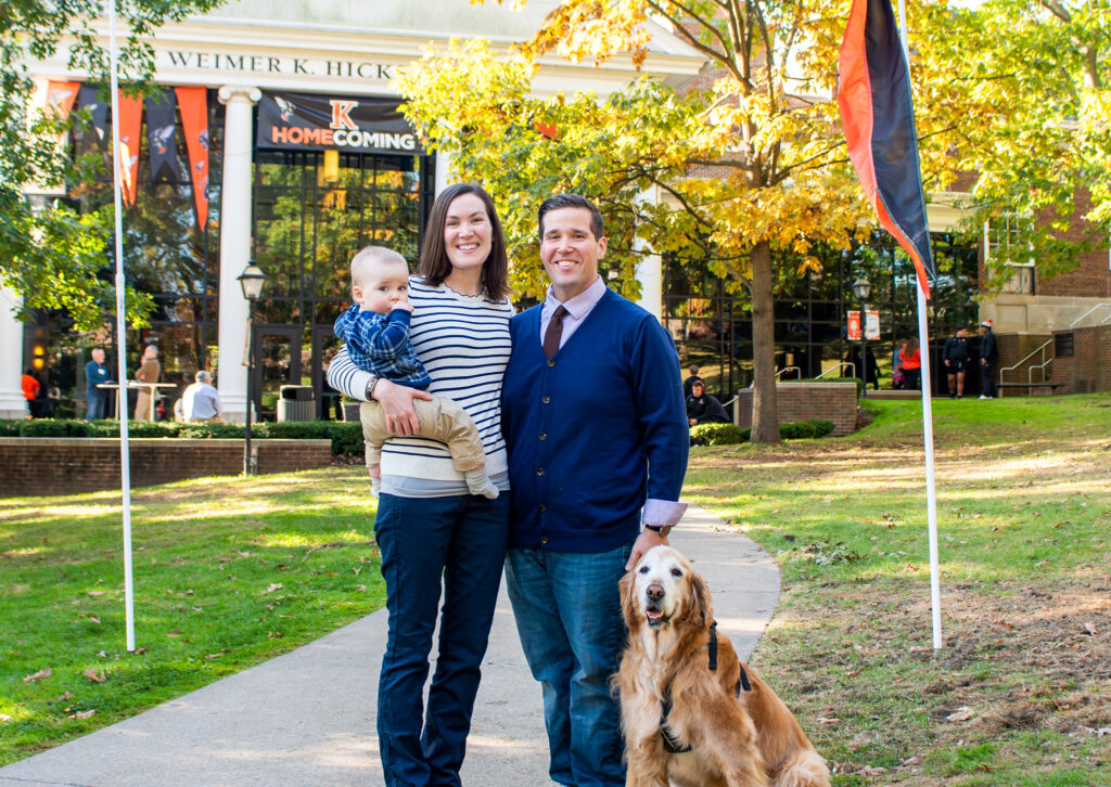 Helmstetter and his wife, K alumna Elizabeth Haworth-Hoeppner ’10 and son, in front of Hicks center 