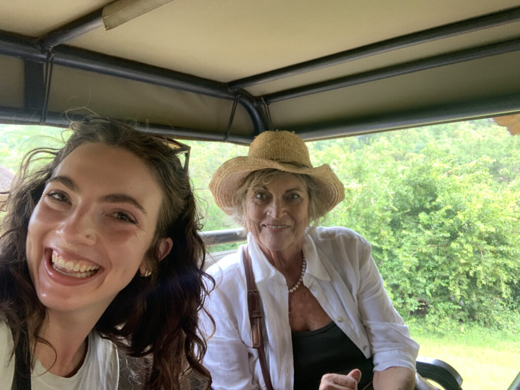 Elle Waldron ’23 enjoying a wildlife safari with her host in South Africa.