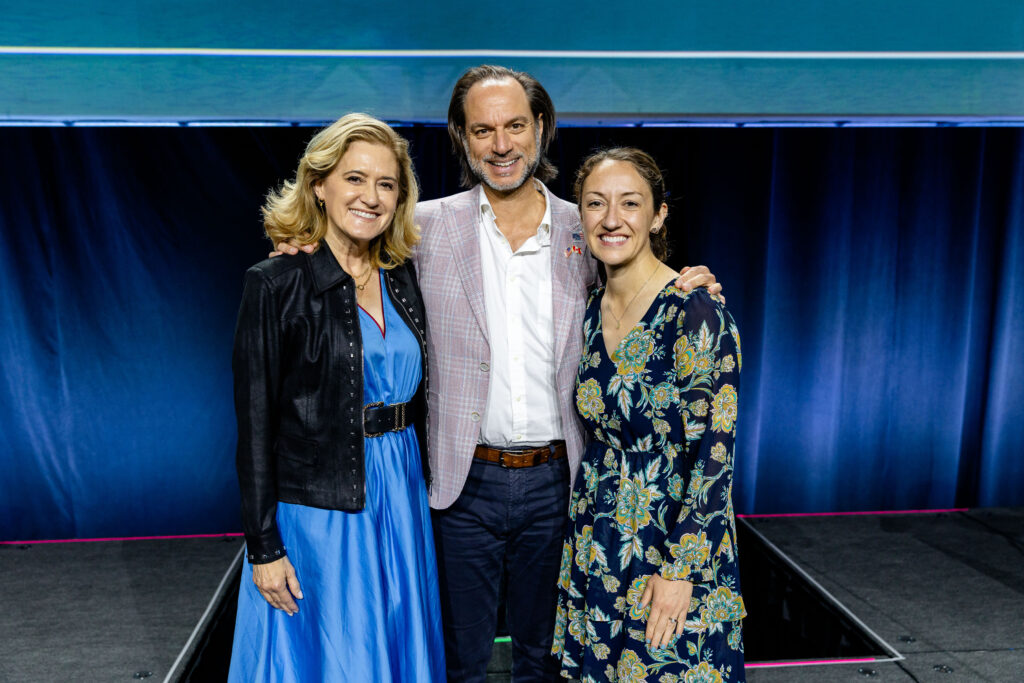 Gila Dorostkar, Hakan Koymen, and Colleen Greene, members of the American Academy of Pediatric Dentistry, smiling together at the annual conference.