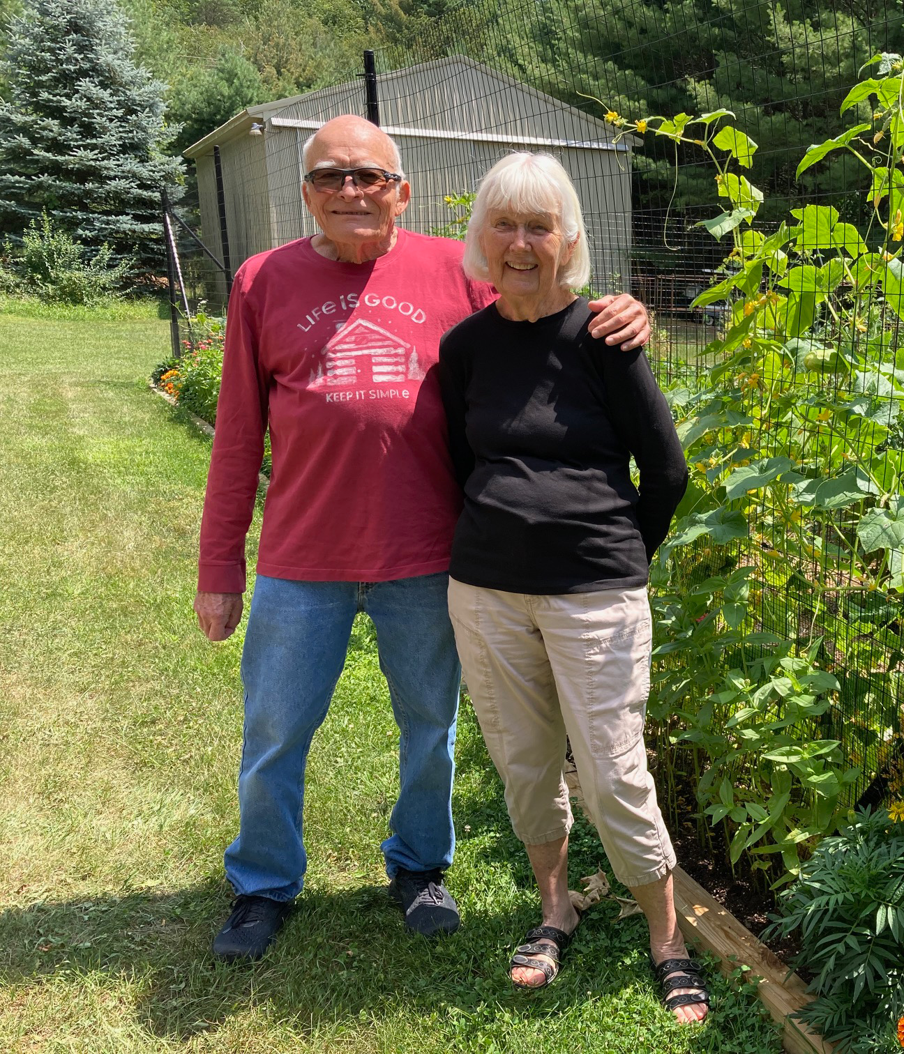 Dave Bellingham '63, alumni, with wife Jan, enjoying their garden