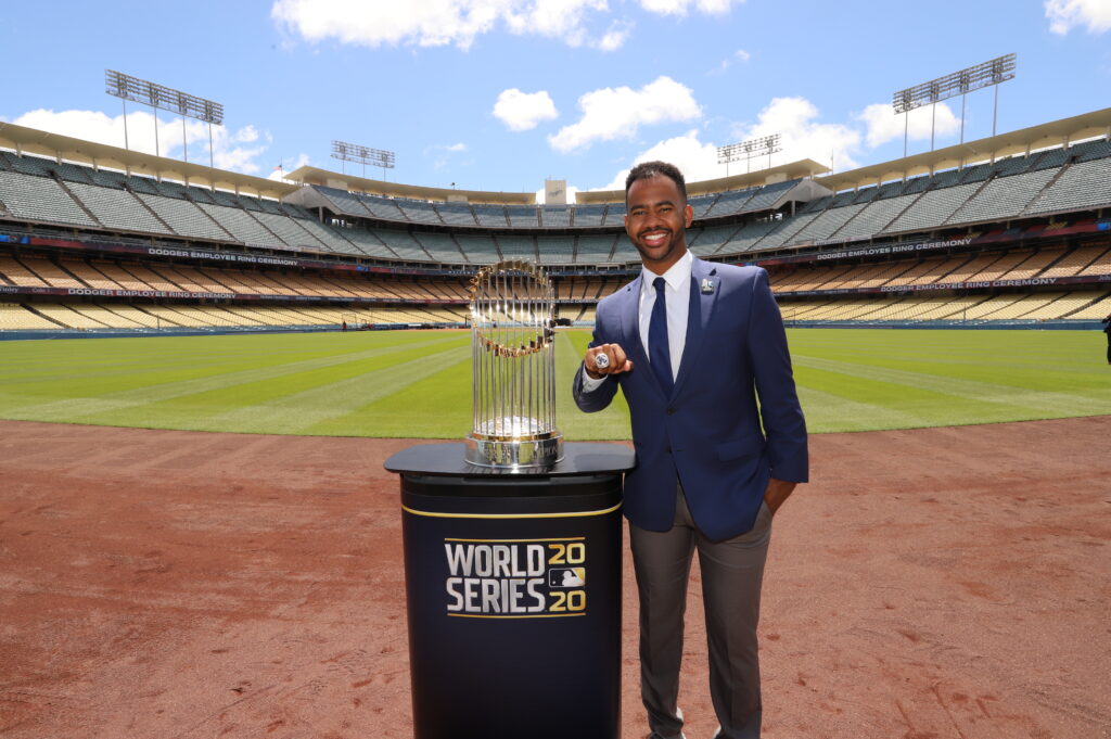 Jordan Wiley ’19 with the World Series Trophy and a Championship Ring at Dodgers Stadium